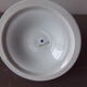 Old candle holder in flowered porcelain