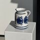 Artisan blue floral decorative carafe, height 17 cm, diameter 24.5 cm.