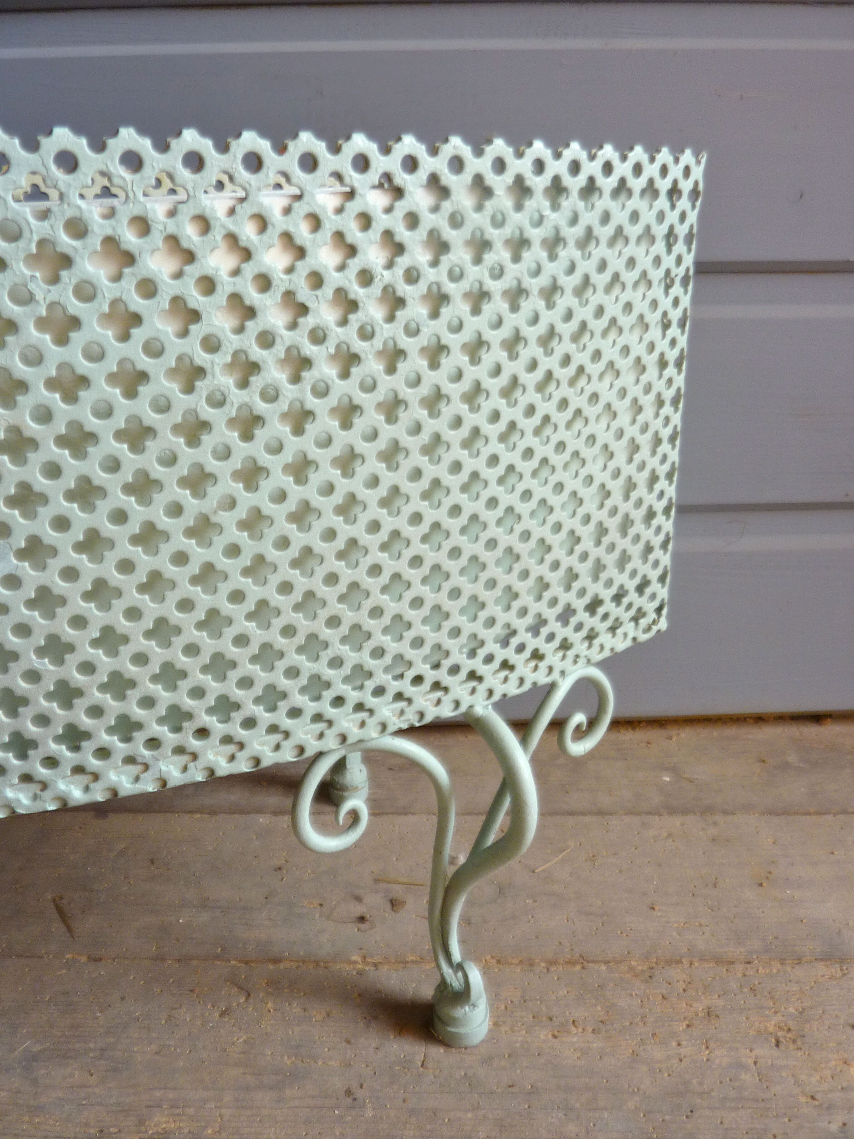 Perforated metal planter from the 1950s