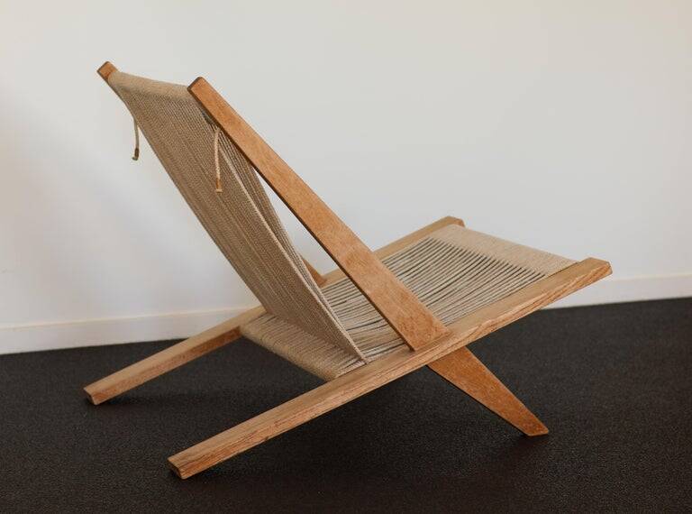 The seminal JH 106 easy chair by Poul Kjærholm & Jørgen Høj – 1952