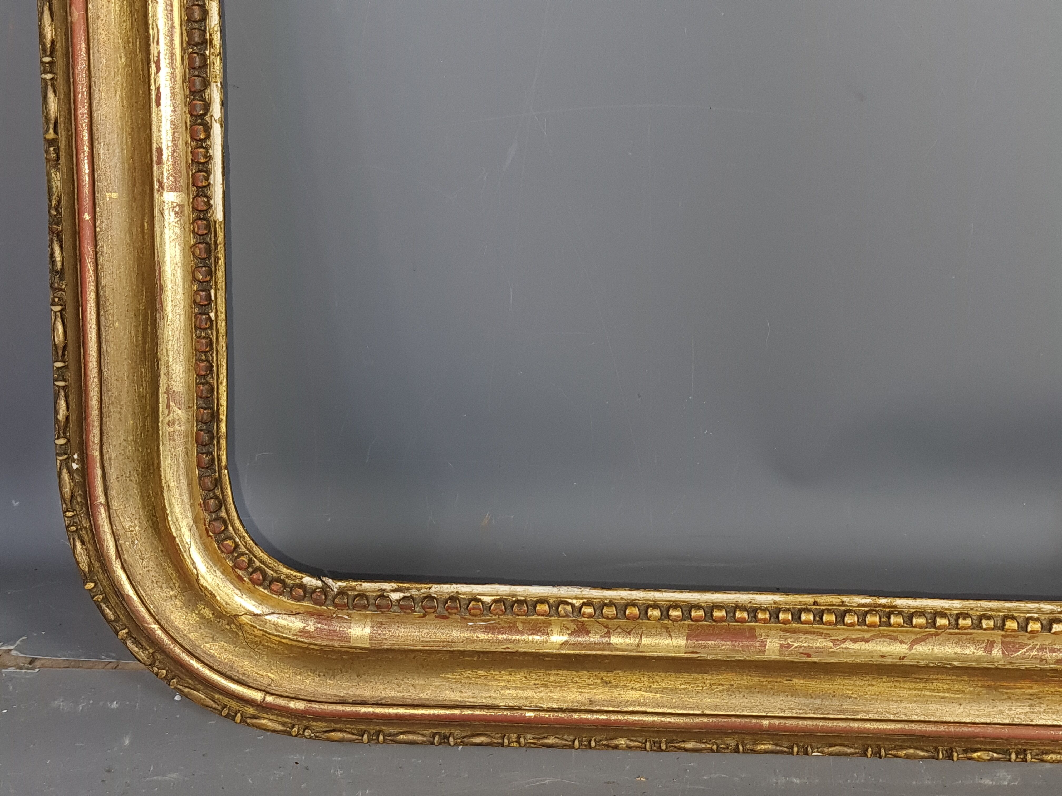Old frame with doucine gilded stucco wood