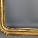 Old frame with doucine gilded stucco wood