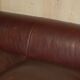 Vintage Art Deco leather sofa, three-seater, feather cushions.