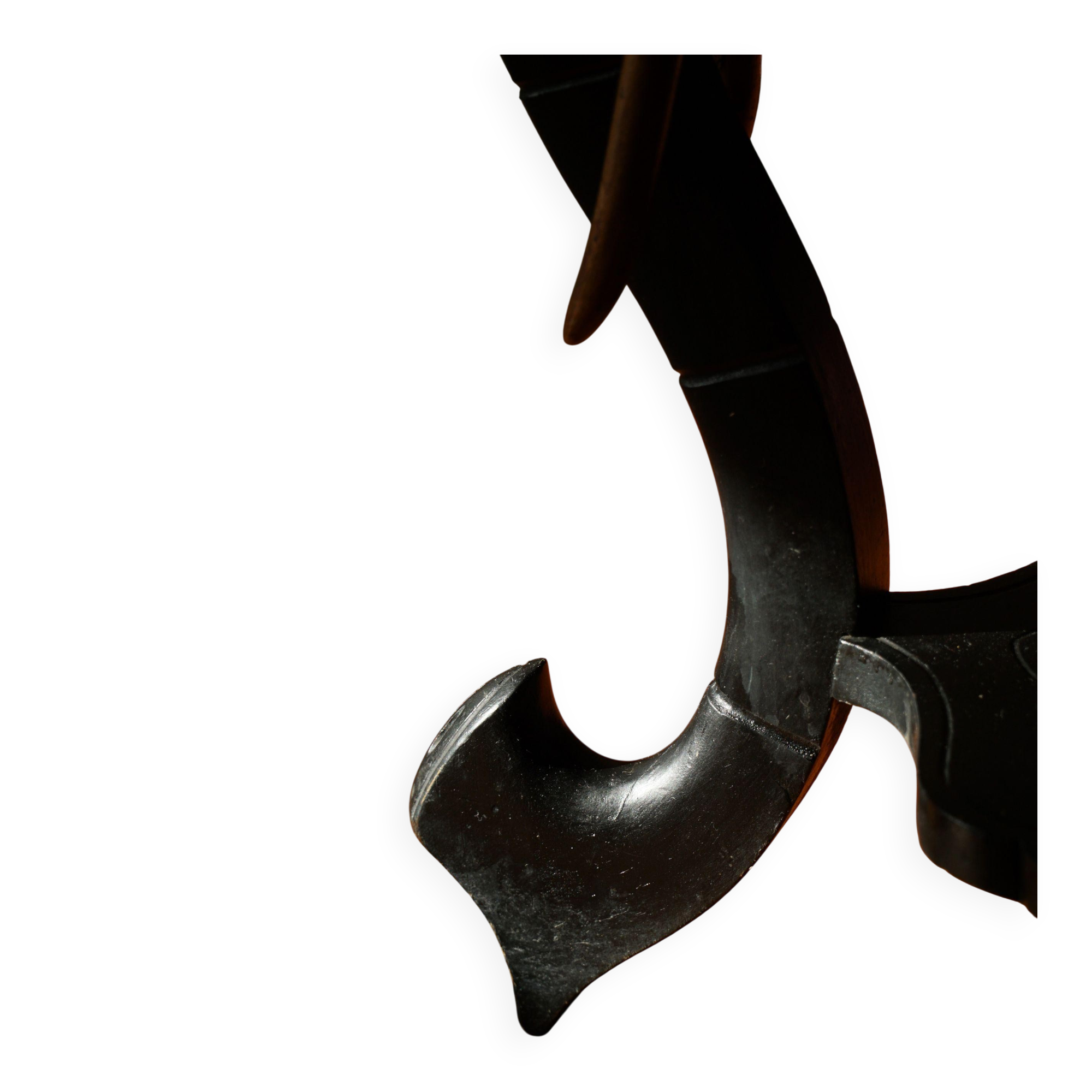 Side table in hardwood ebony with three elephant head-shaped legs, Eastern India, 1920s.