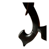 Side table in hardwood ebony with three elephant head-shaped legs, Eastern India, 1920s.