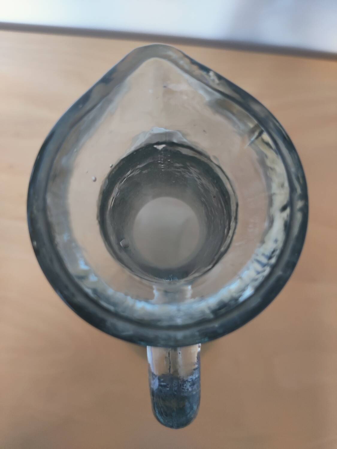 Antique carafe made of thick glass