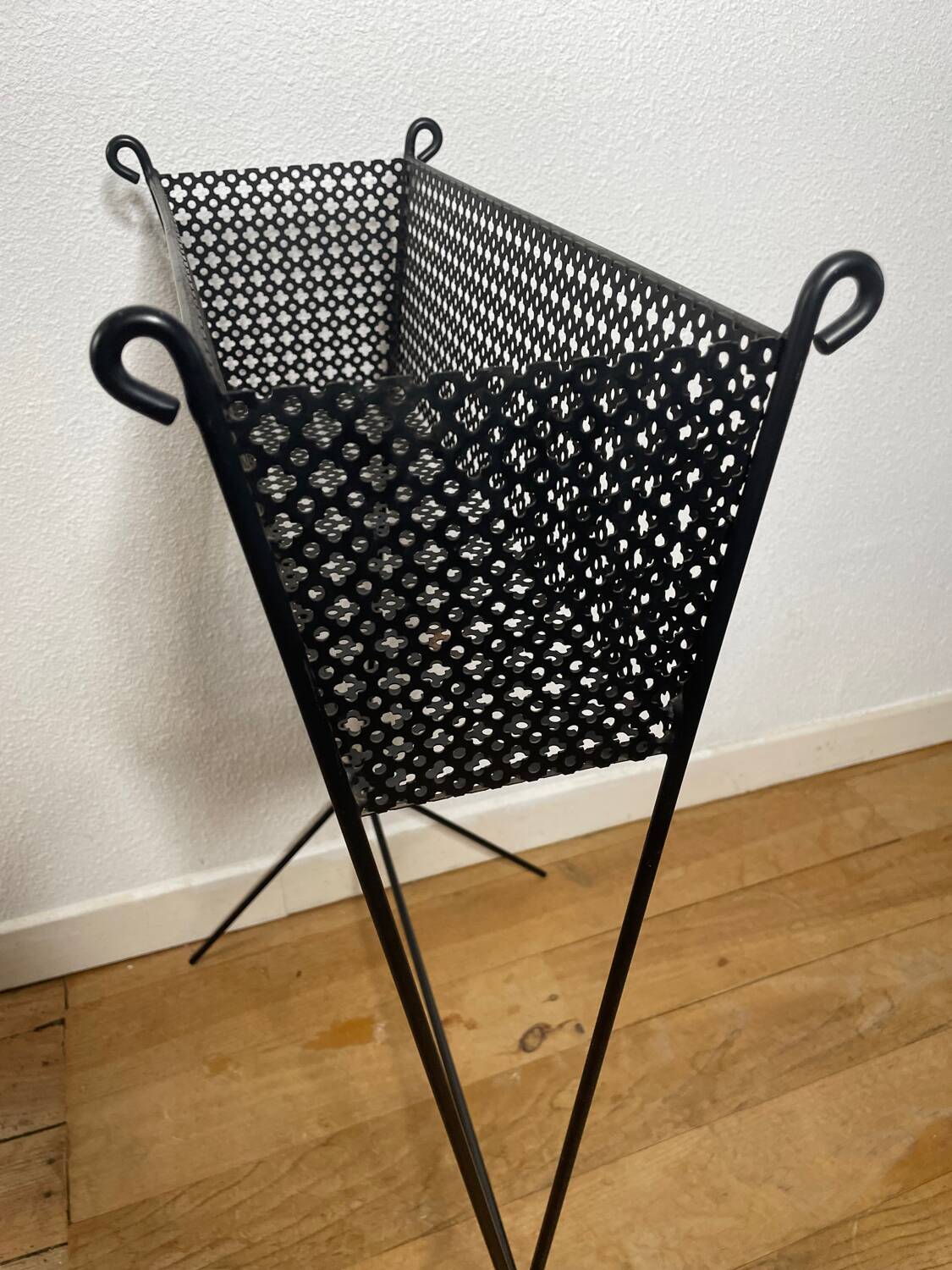 1950s black perforated metal planter in the style of Mathieu MATEGOT
