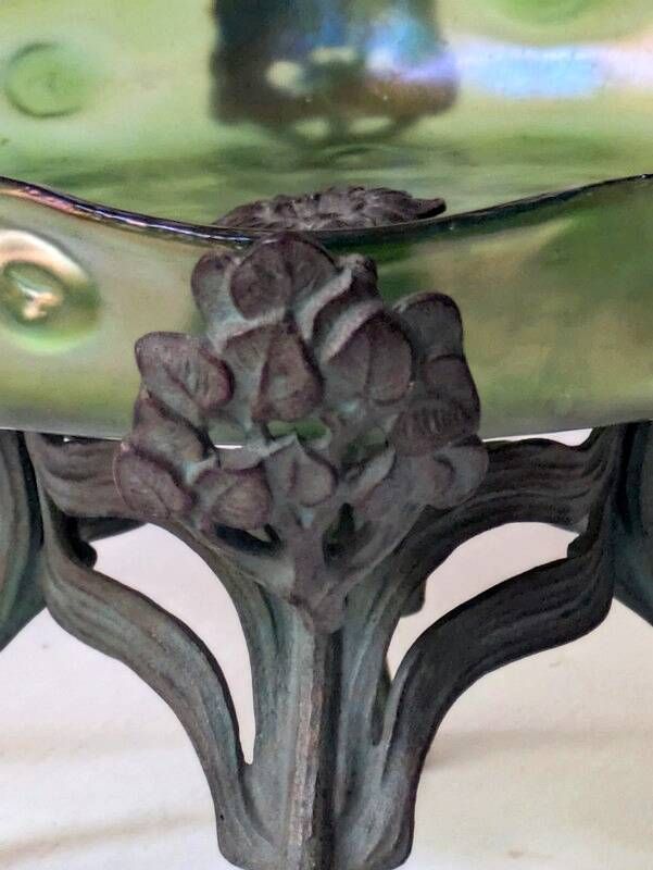 Art Nouveau cup in iridescent glass and bronze-style metal