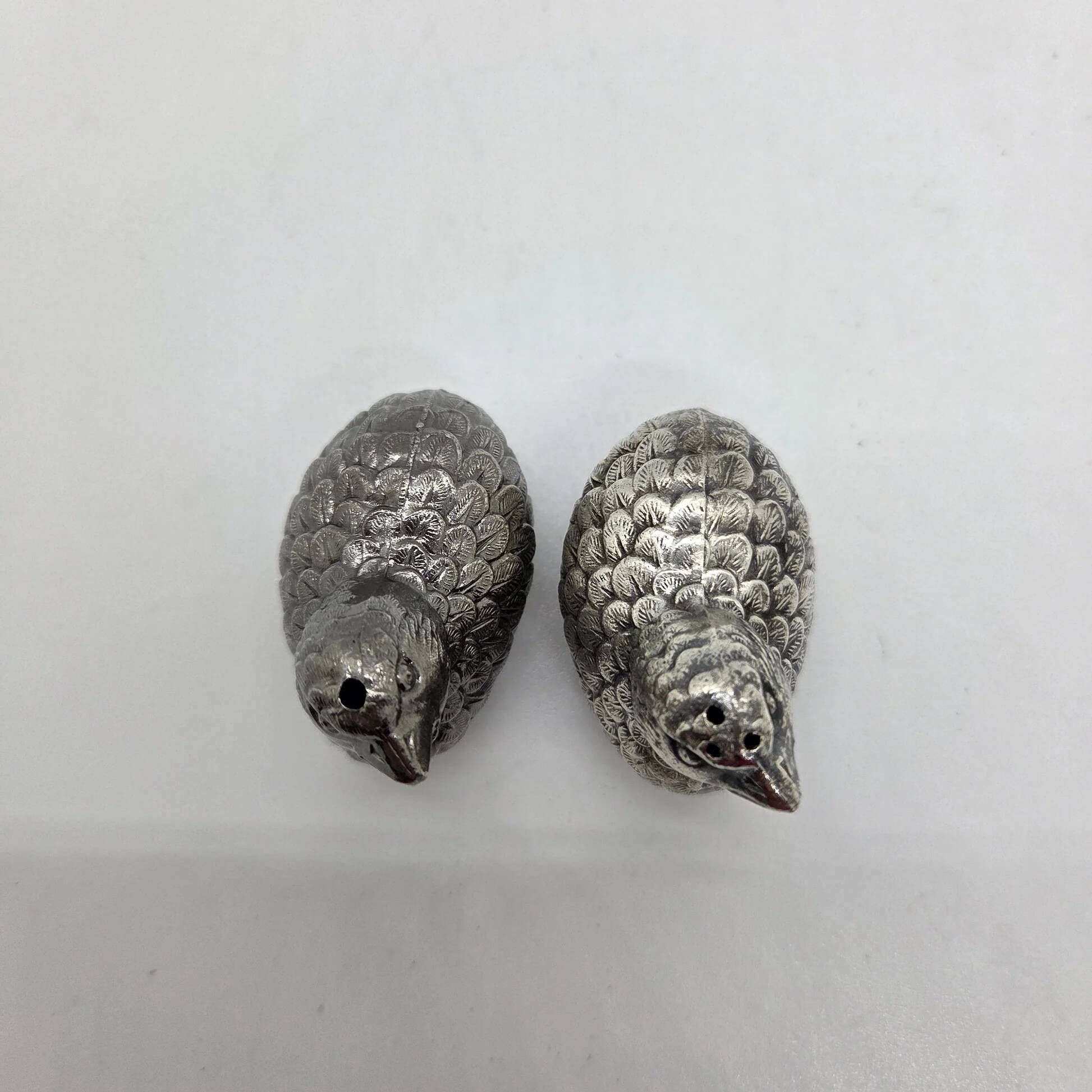 Pair of silver-plated metal bird salt and pepper shakers