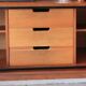 Scandinavian teak enfilade in brown, 4 doors, 1960s lines, floating legs.