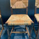Four straw chairs