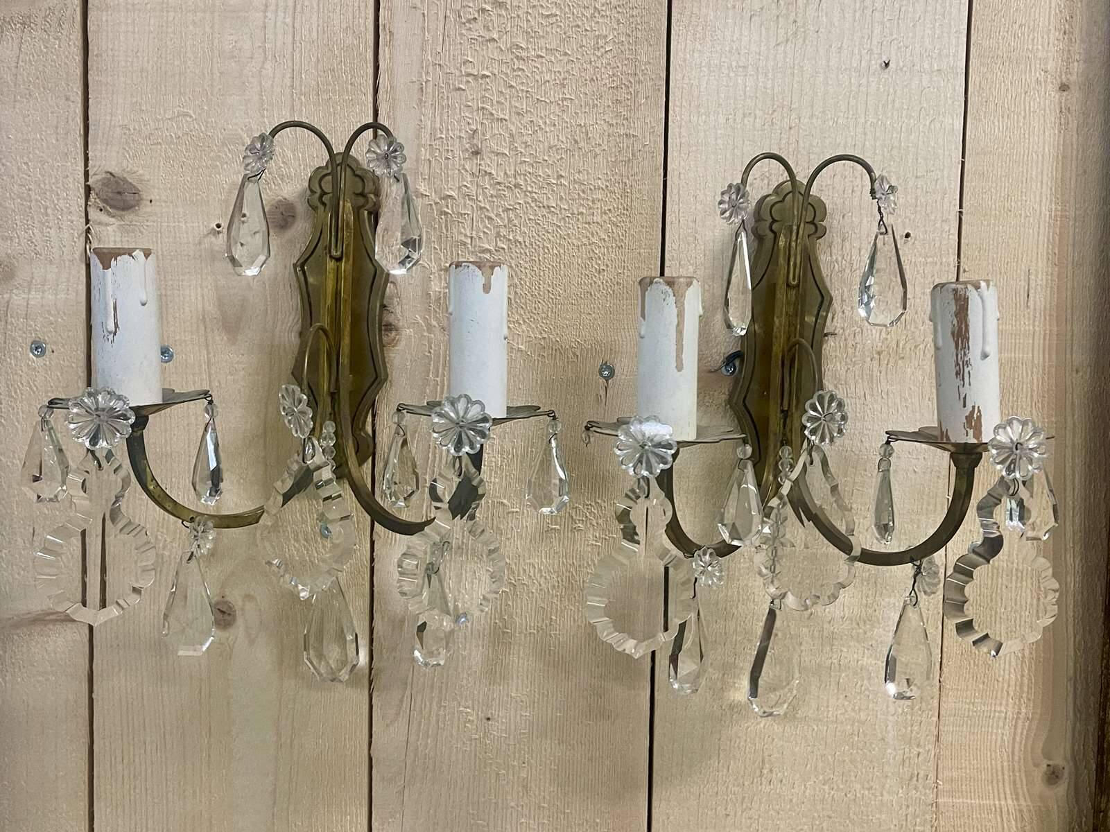 Pair of bronze sconces and pendants from the early 20th century