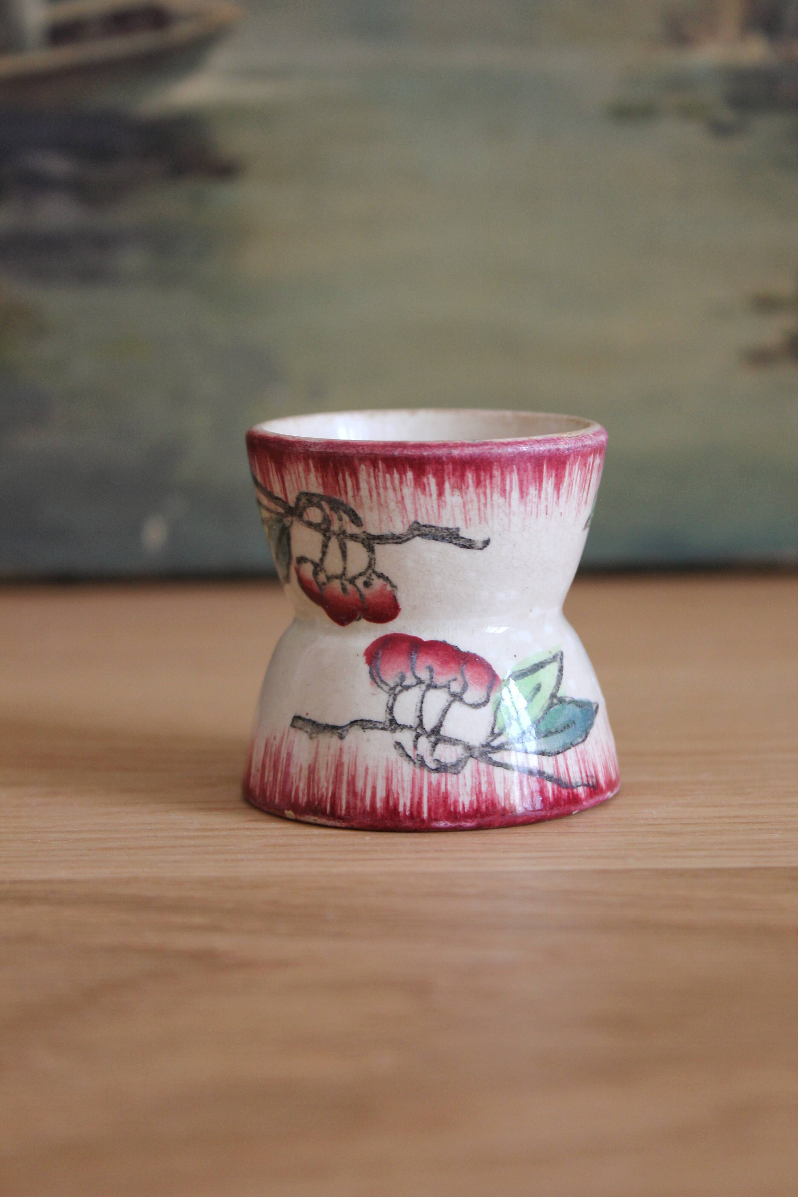 Old diabolo egg cup in Longwy iron clay