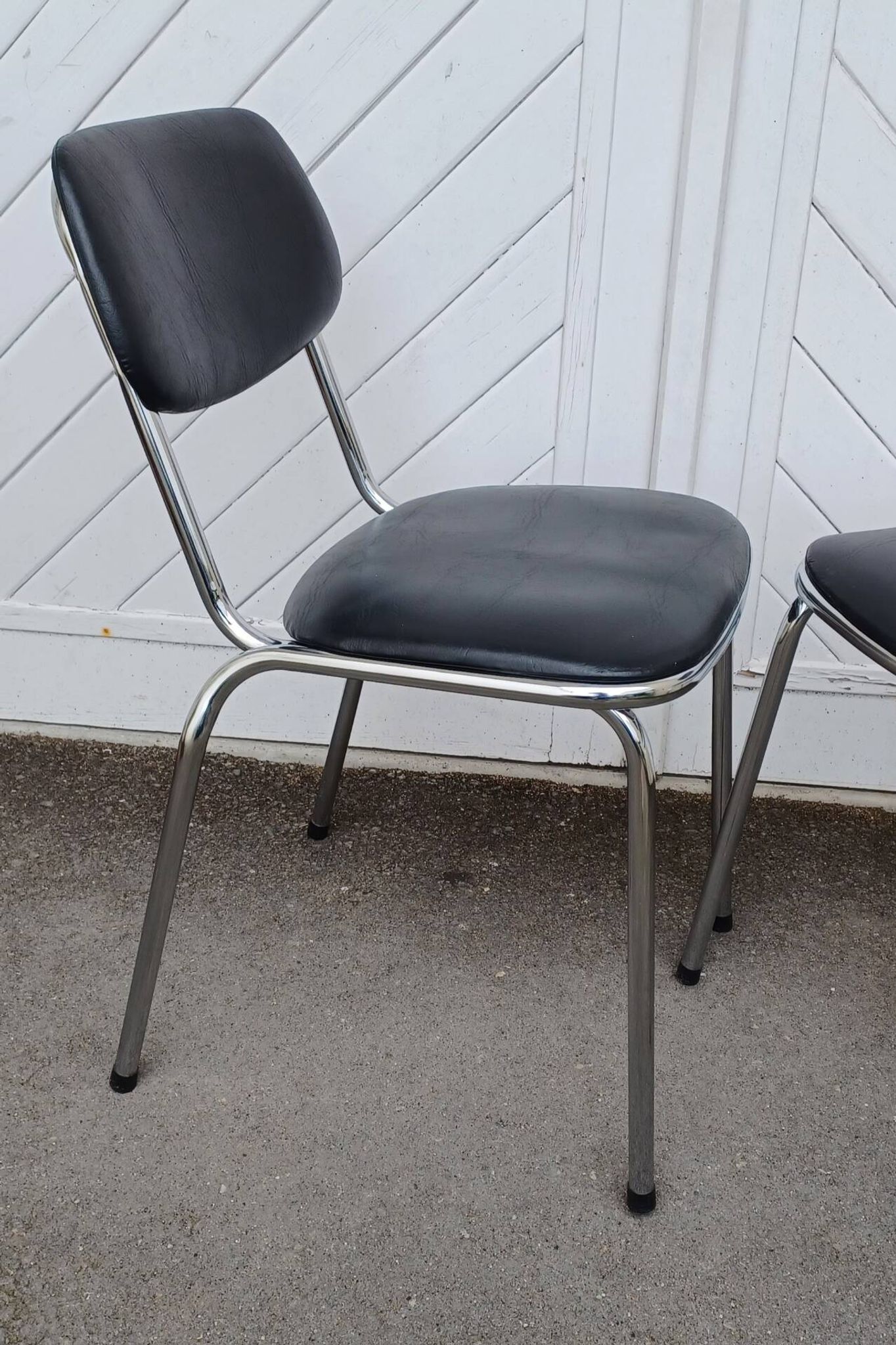 Pair of vintage faux leather and chrome chairs