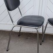 Pair of vintage faux leather and chrome chairs