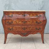 Louis XV curved chest of drawers in rosewood marquetry
