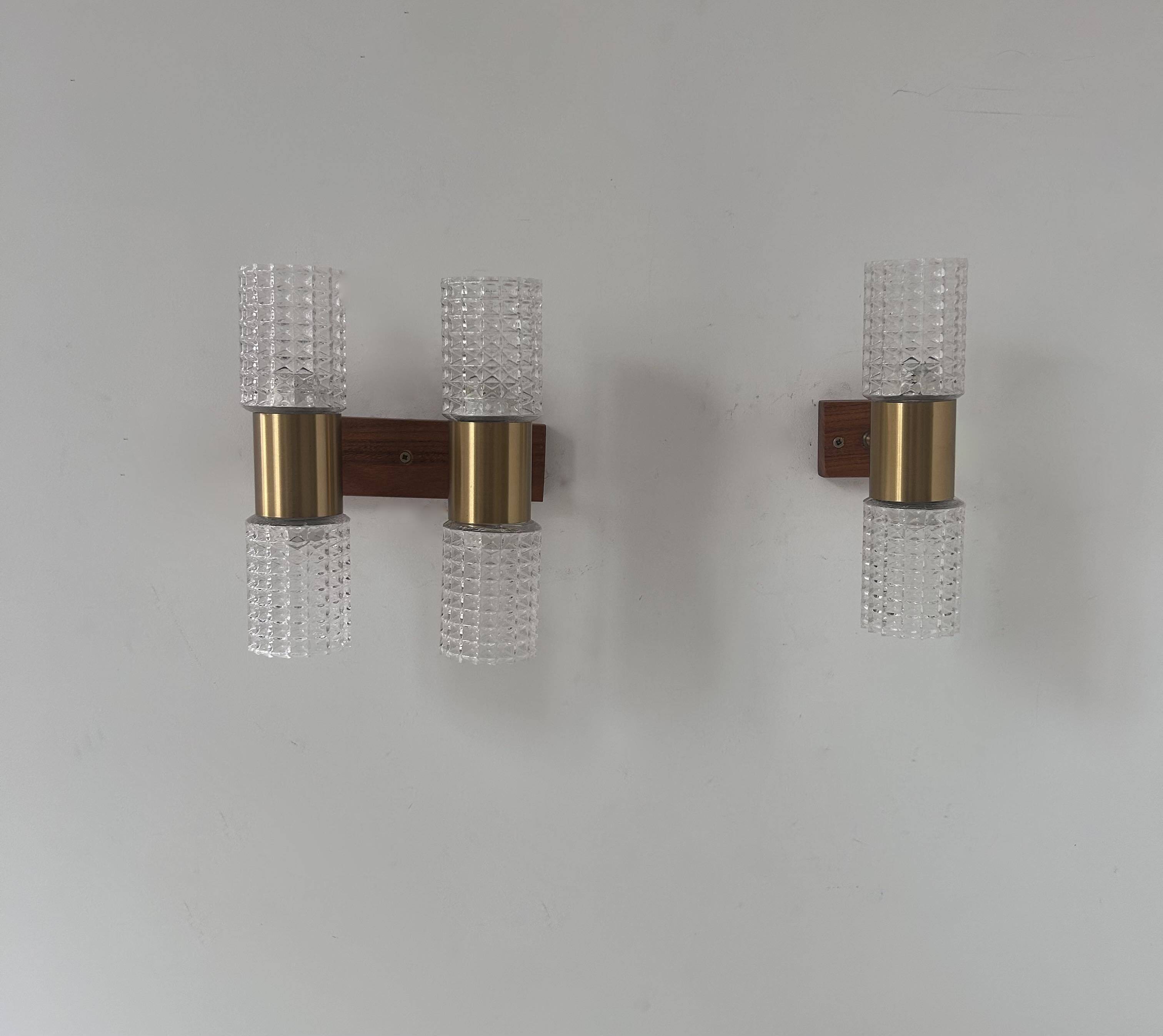 Pair of vintage wall lights, brass and molded glass, Sweden 1960s