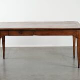 Elegant and subtle antique French dining table made of fruitwood