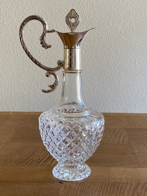 Glass and silver metal ewer