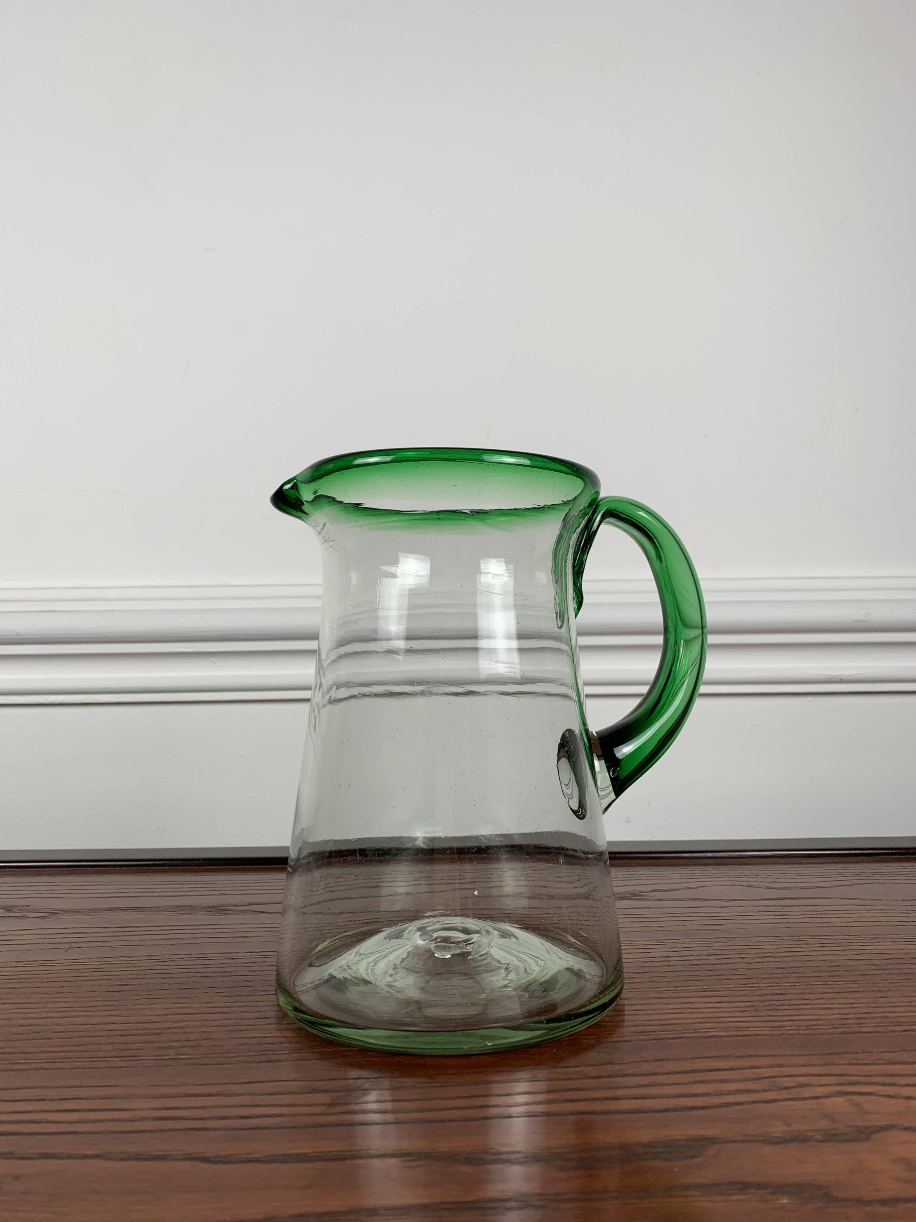 Vintage blown glass jug, green border