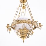 Brass chandelier from the first half of the 20th century.