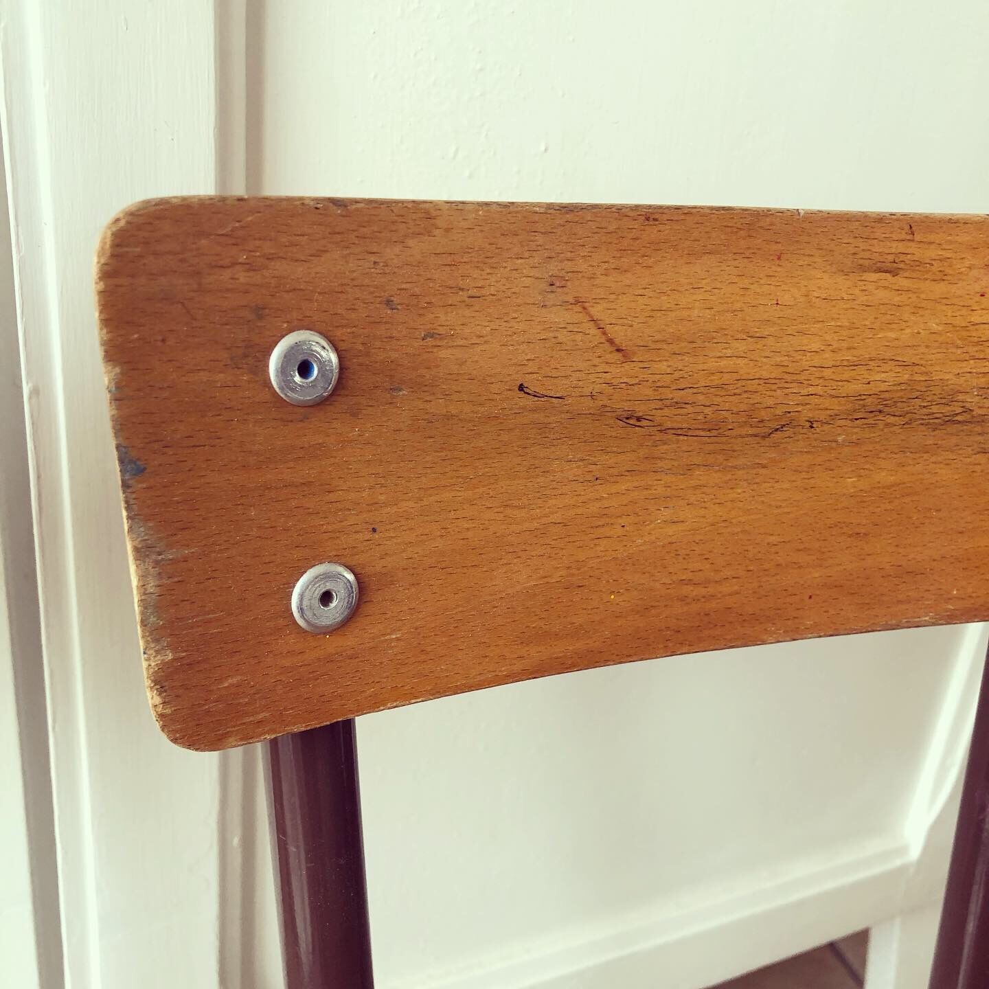Duo of brown child school chairs