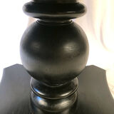 Circular table in blackened wood, central baluster leg