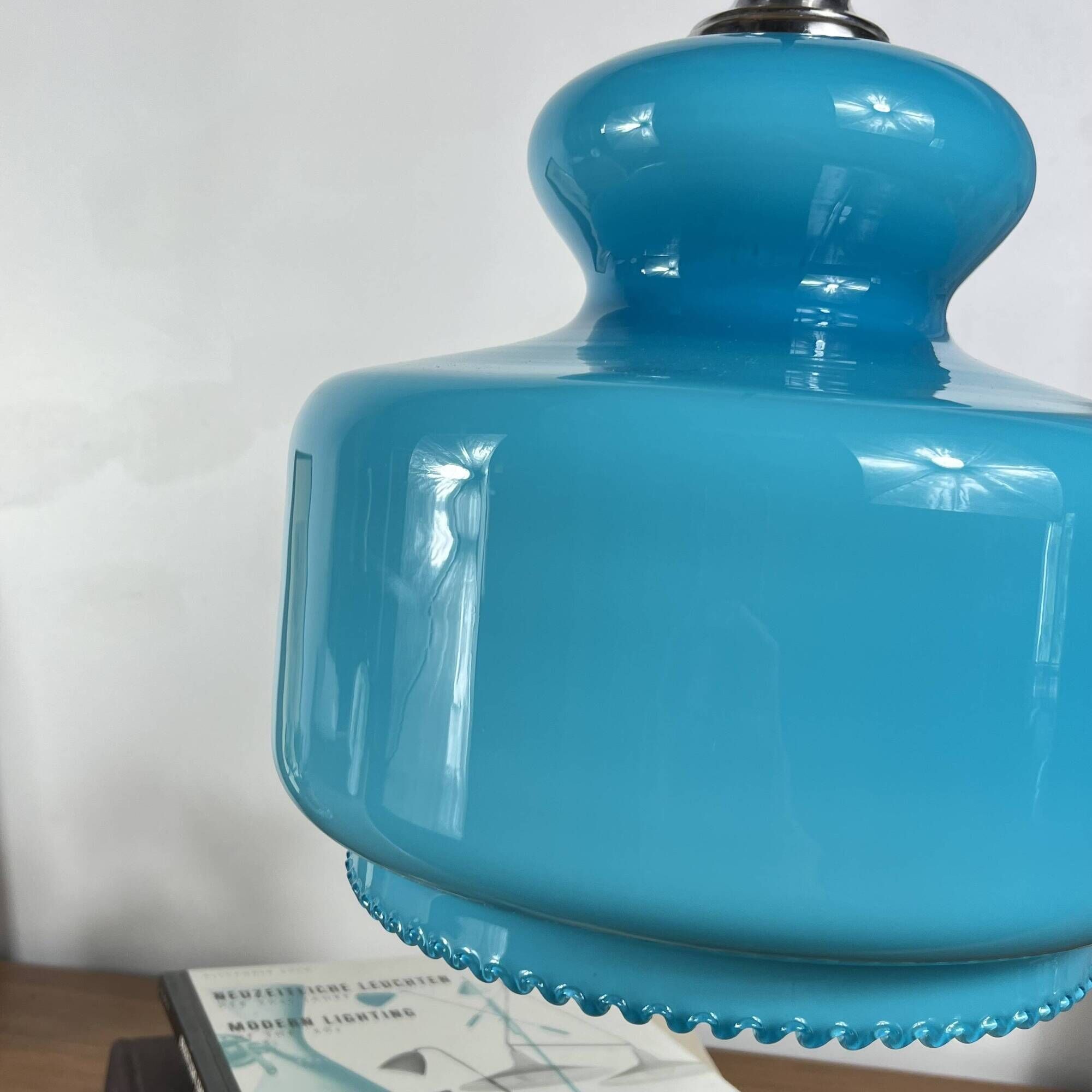 Suspension lustre globe in blue opaline glass from the 1970s.