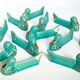 Set of 12 turquoise blue and gold duck knife holders mid-20th century