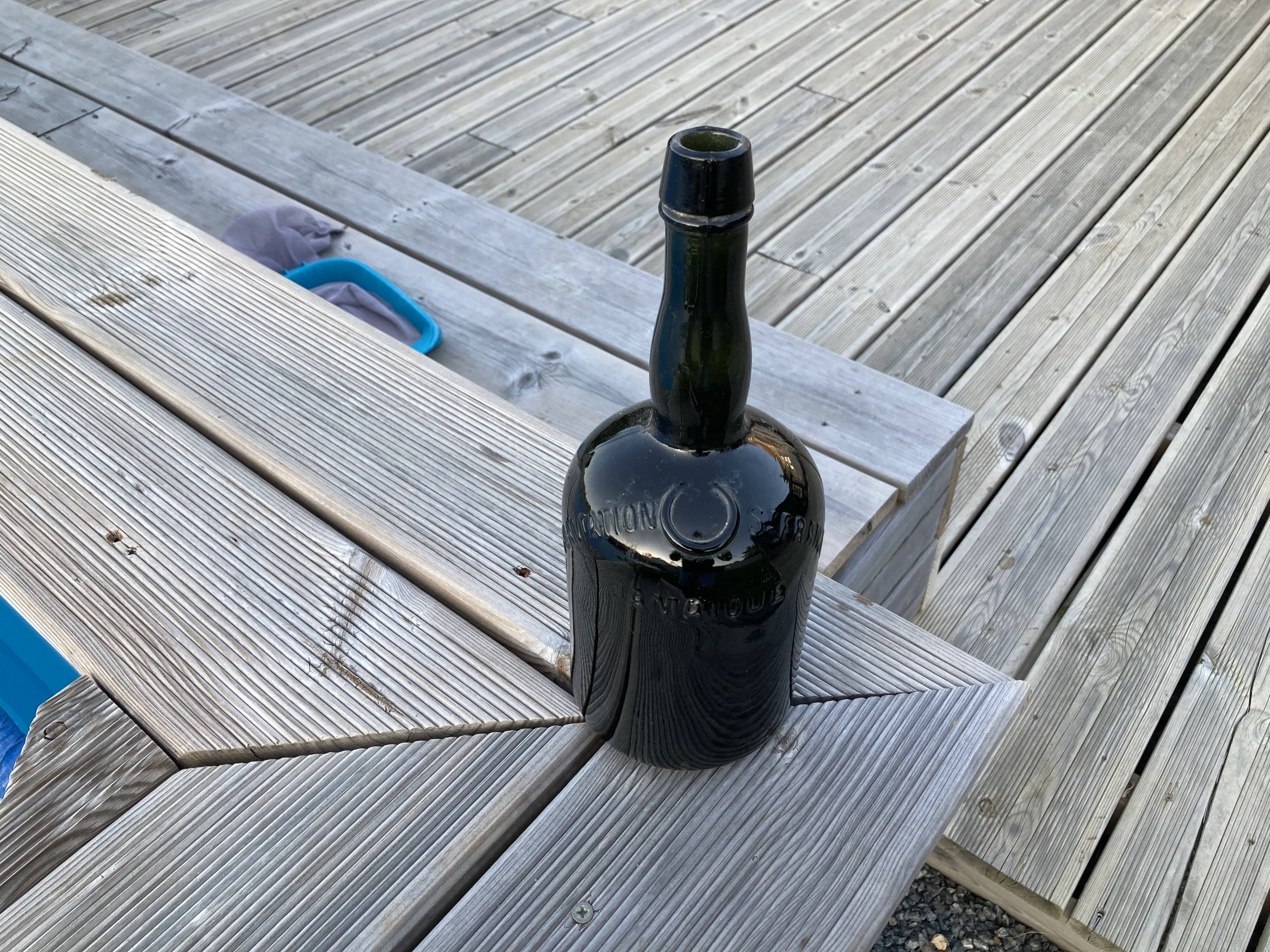 Set of three Vintage Rum Bottles