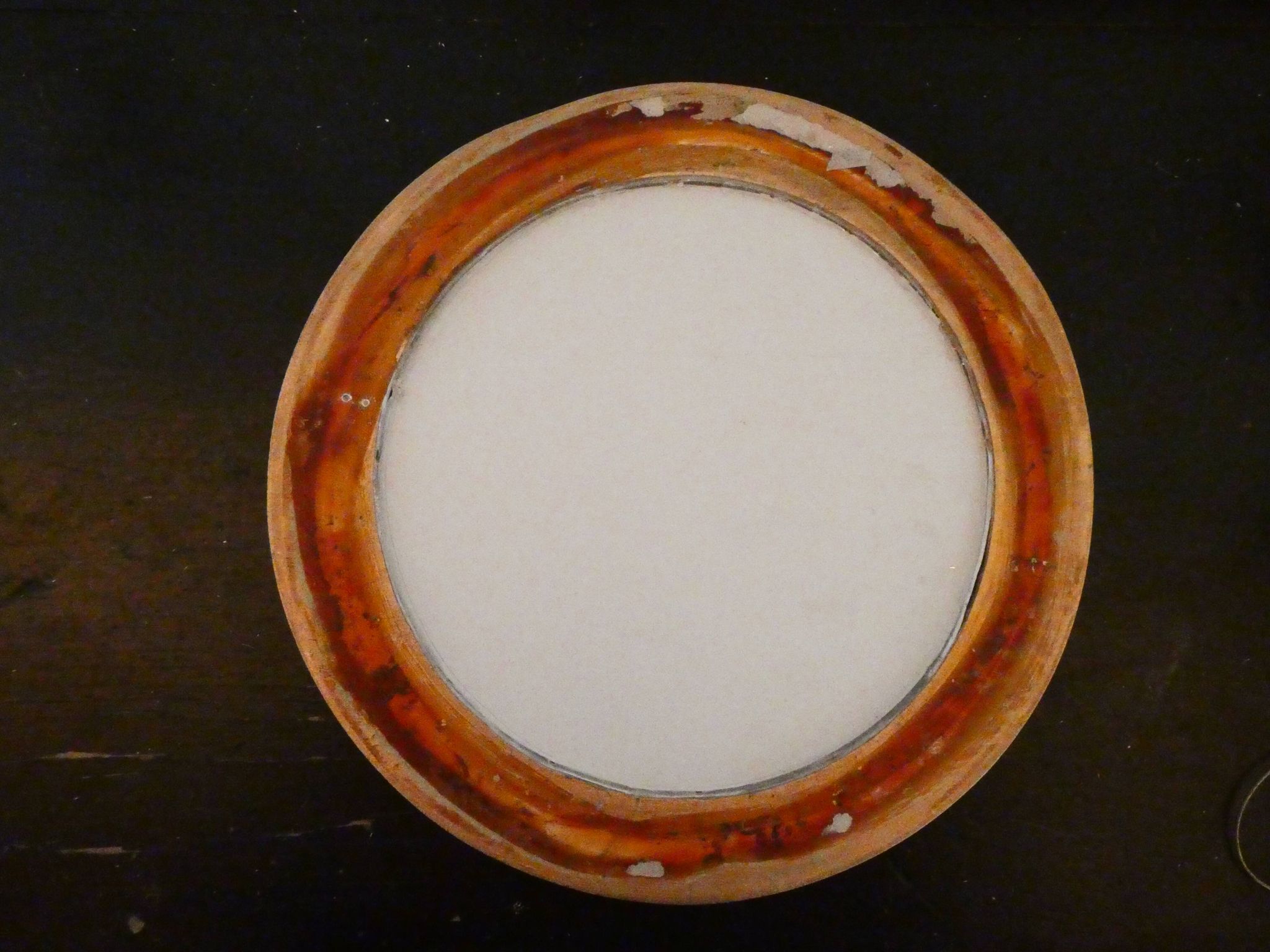 Round golden mirror