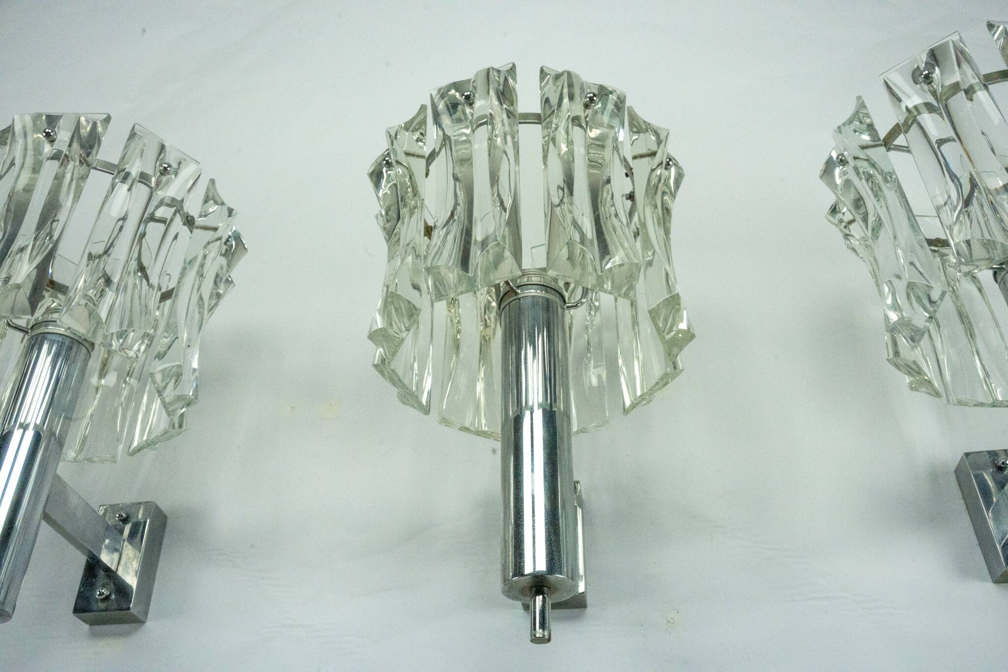 Set of four large Murano glass elements and chromed brass sconces, Italy 60