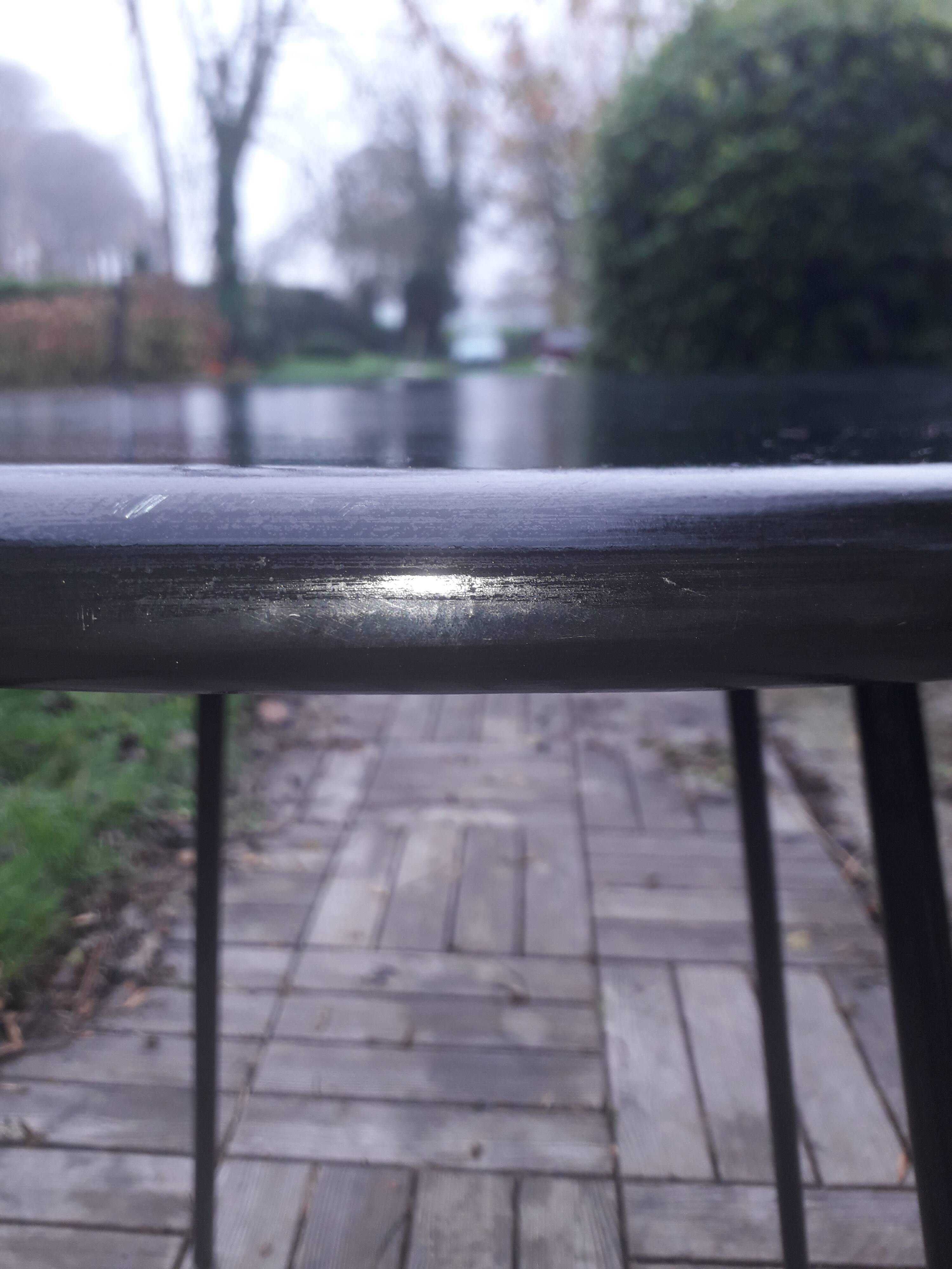 Black metal table compass feet