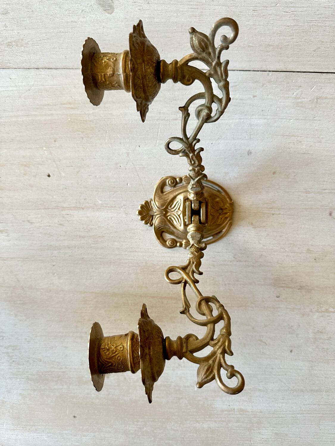 Pair of brass wall candle holders