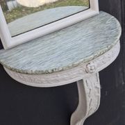 Console and mirror