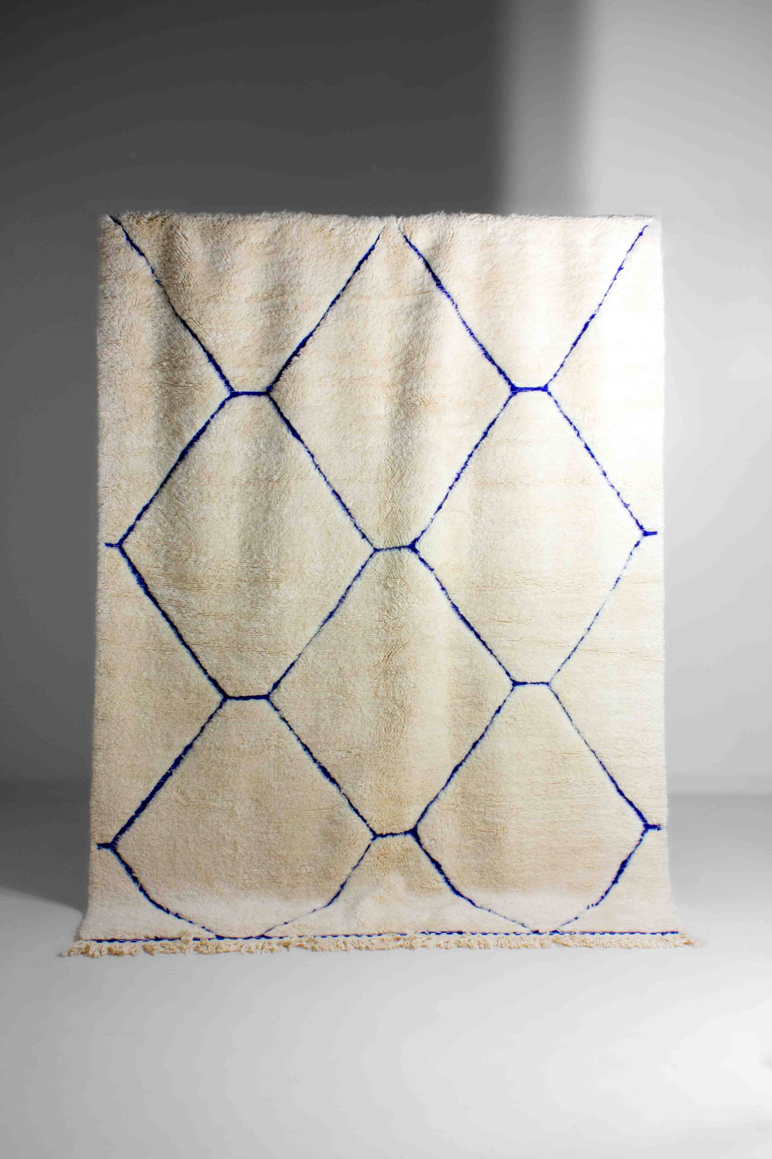 Vintage berber rug in ivory and blue wool