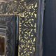 19th-century mirror Napoleon III in blackened wood on a gold background.