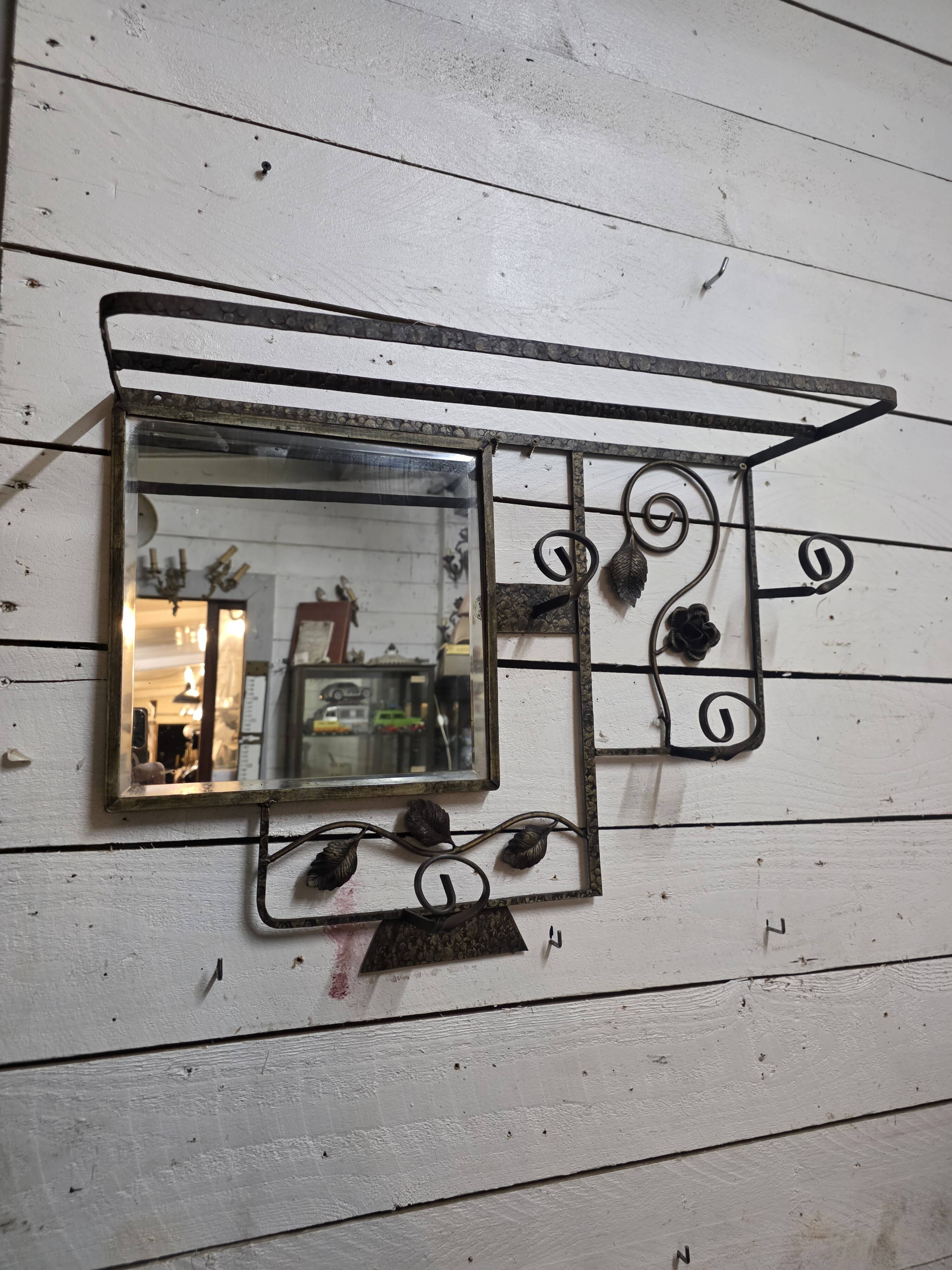 Art Deco coat rack in hammered wrought iron, 1950s.
