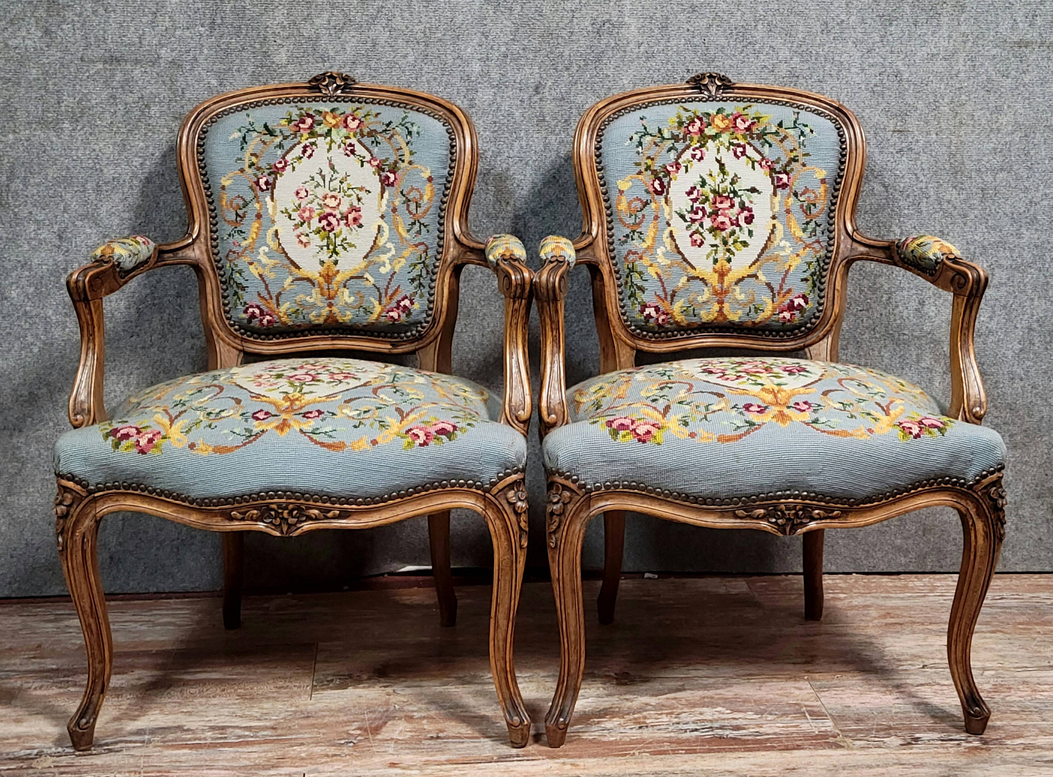 Pair of Louis XV style cabriolet armchairs in walnut