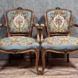 Pair of Louis XV style cabriolet armchairs in walnut