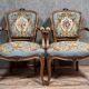 Pair of Louis XV style cabriolet armchairs in walnut