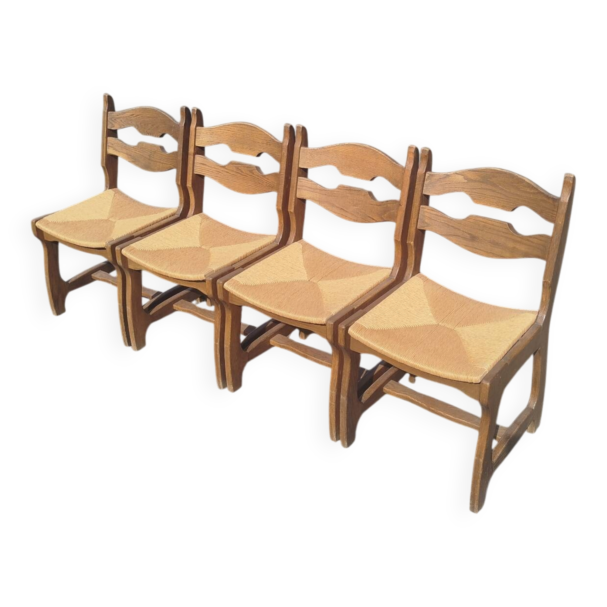 Set of 4 solid oak chairs with straw, in the style of Guillerm.