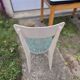 Vintage Scandinavian table and chair set with a wooden frame and formica top.