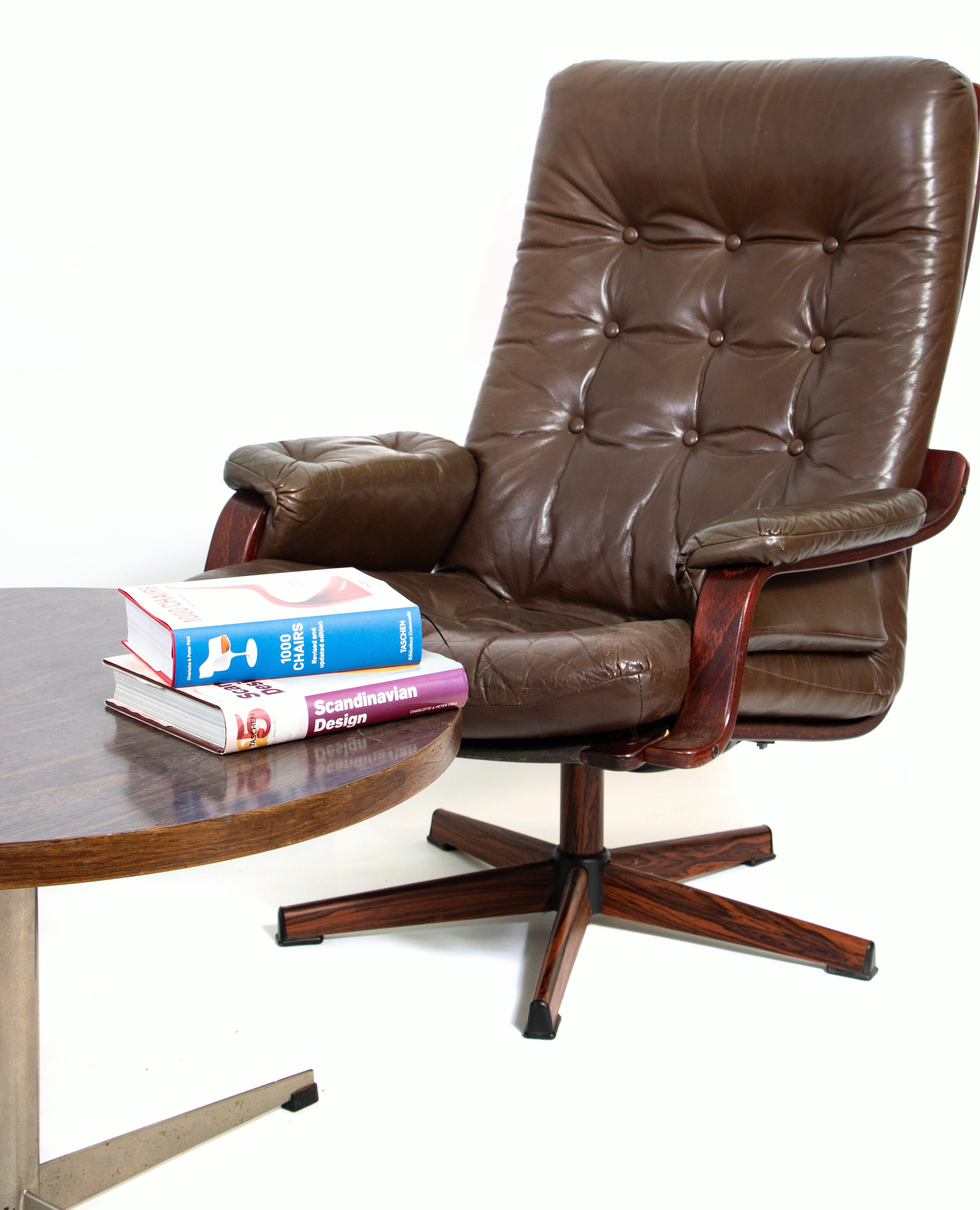 Pair of 2 Swedish swivel leather chairs