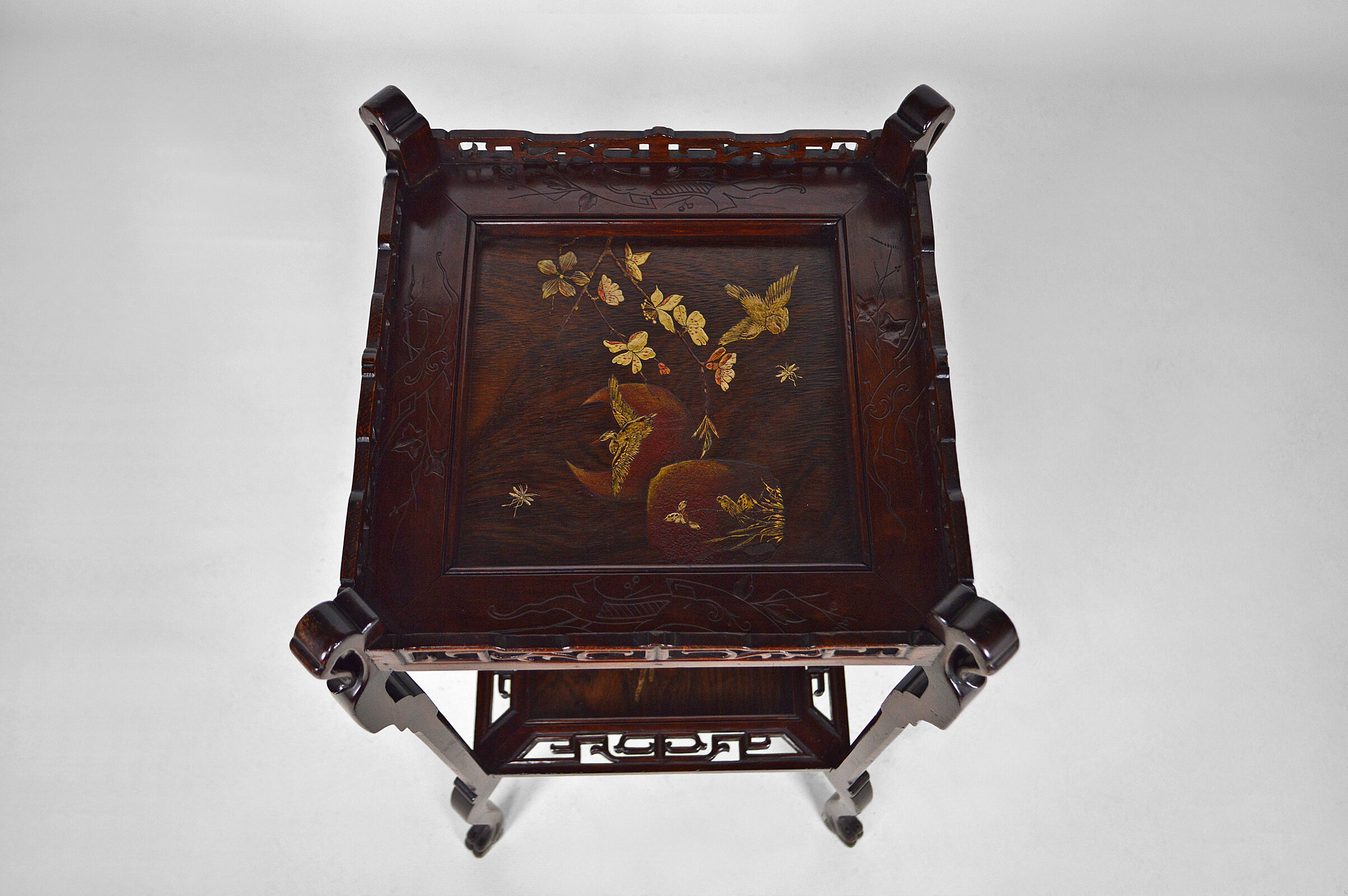 Japanese pedestal table in carved wood and lacquered panels, France, circa 1880