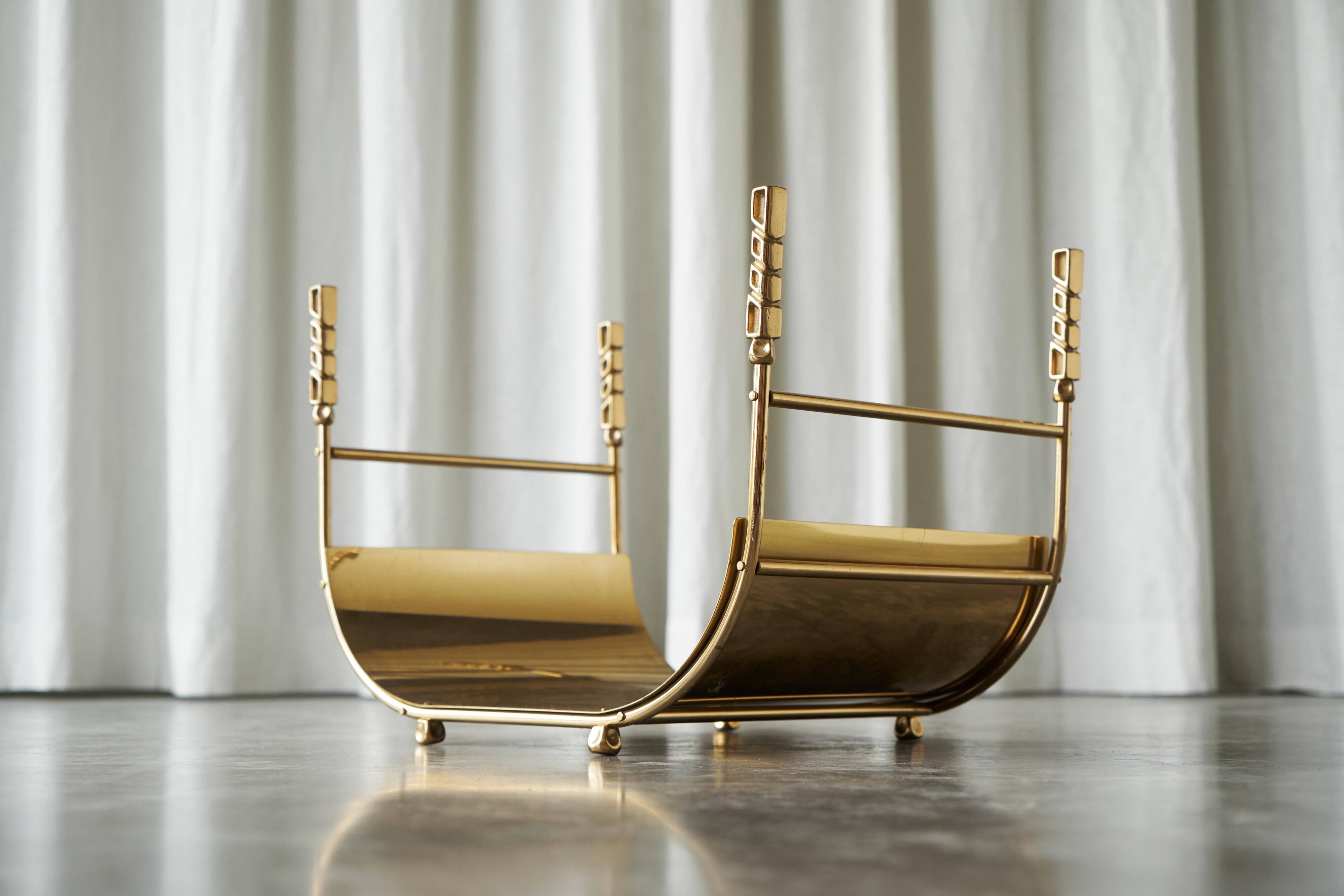 Sculptural brass magazine rack or basket from the 1970s.