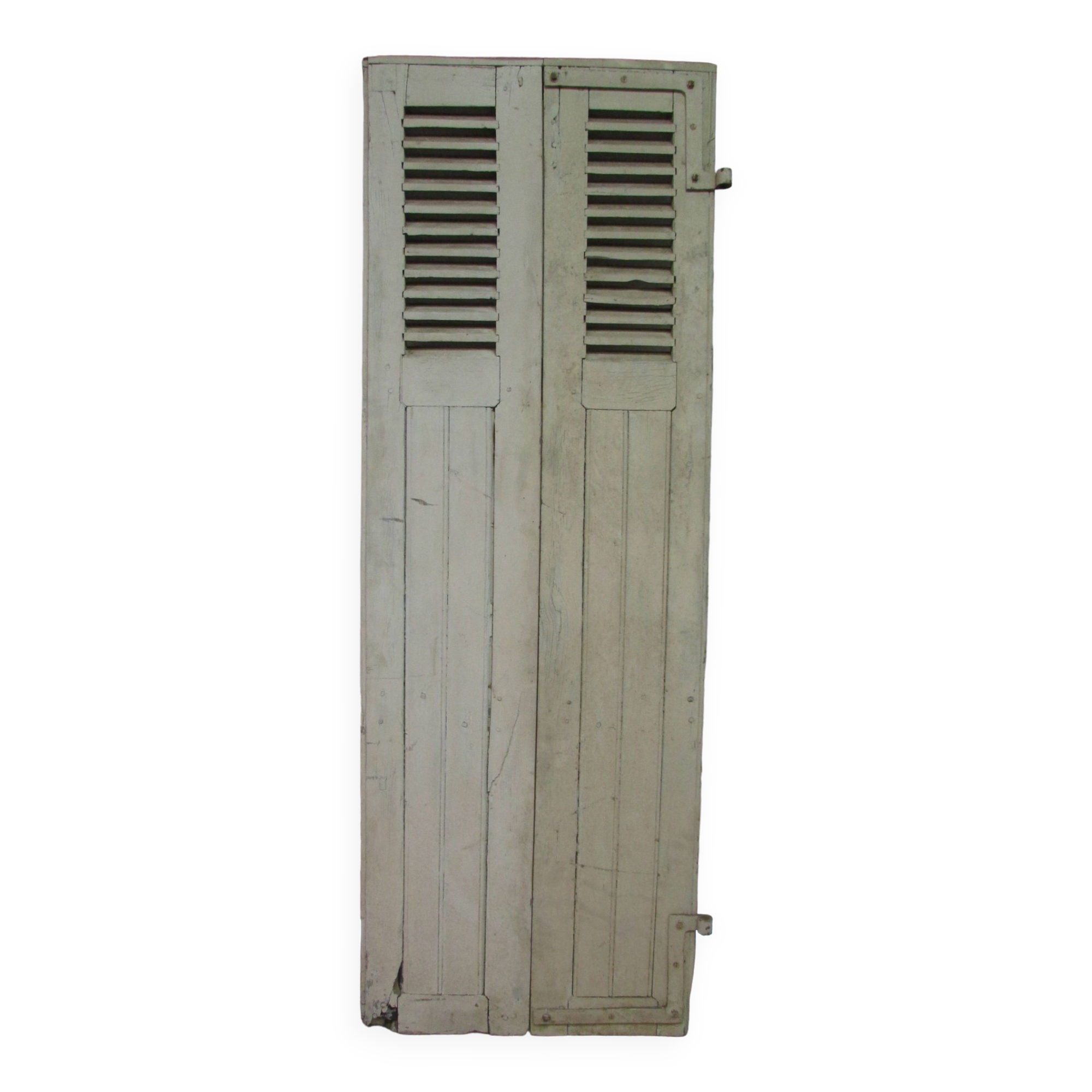 Old shutter in folding wooden louver