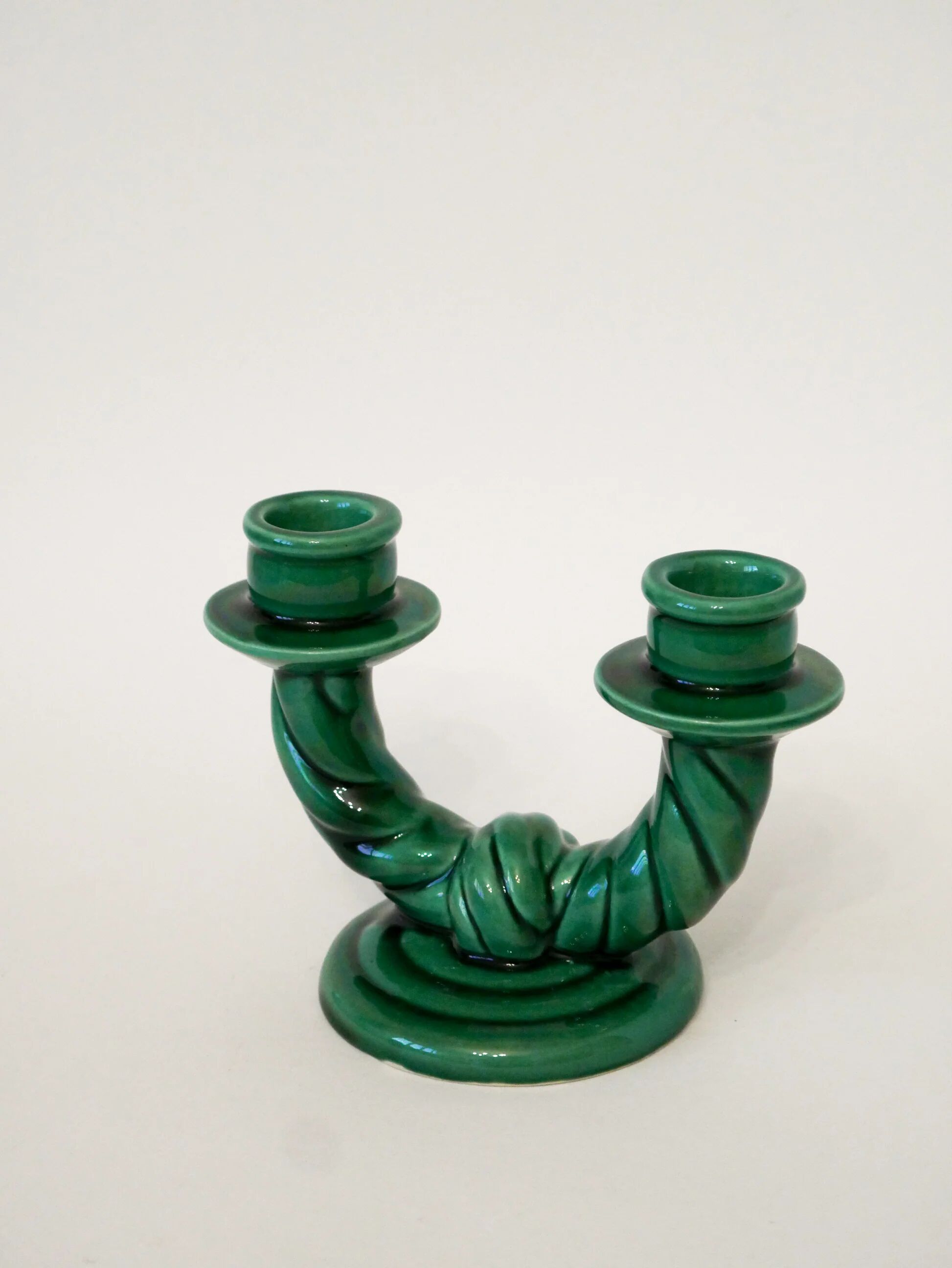 Pair of twisted green ceramic double candlesticks, 1960.