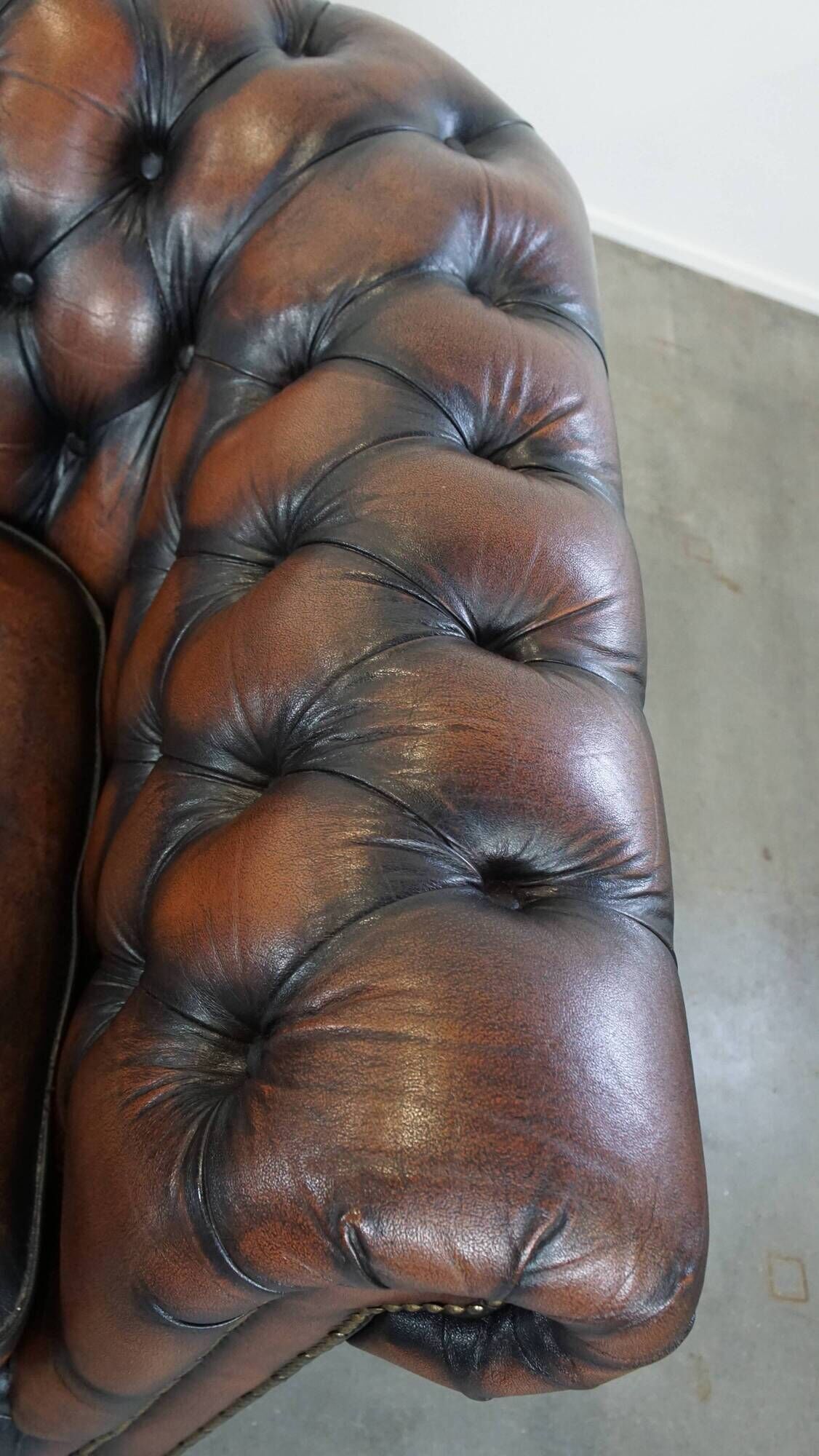 Classic English Chesterfield 2.5 seater sofa in brown cowhide