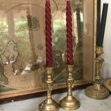 Pair of brass candlesticks with tassels